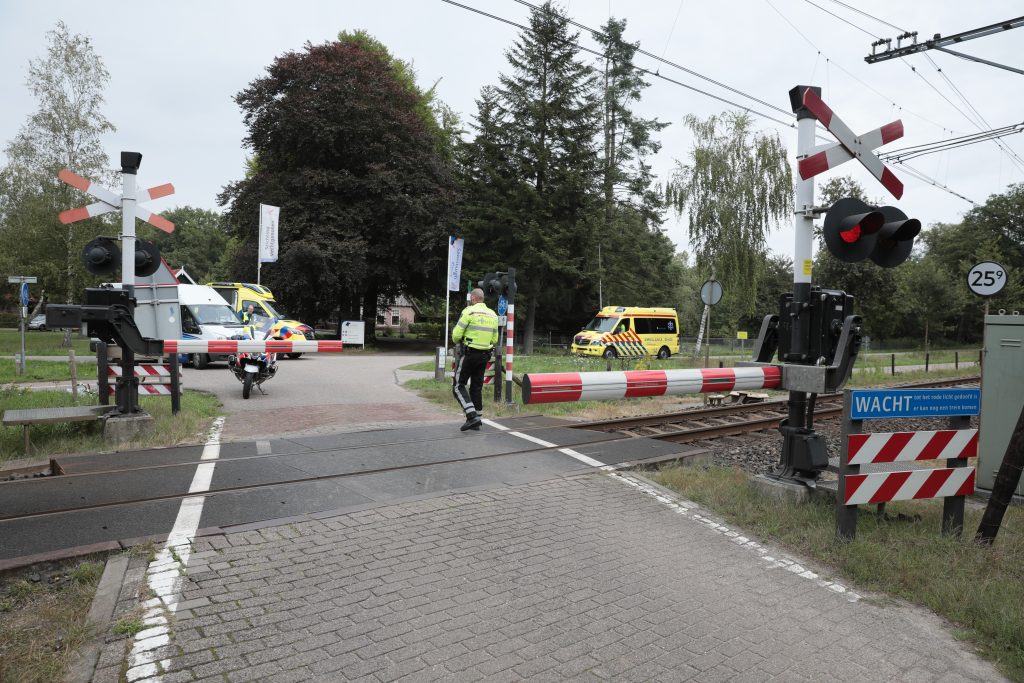 Spoorwegovergang, taxichauffeur